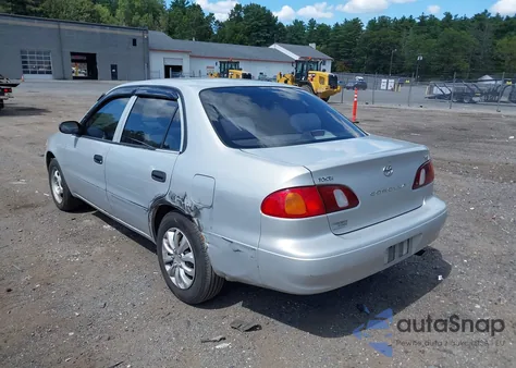 2000 Toyota Corolla Ve z USA, uszkodzony, nr VIN 2T1BR12E6YC309972